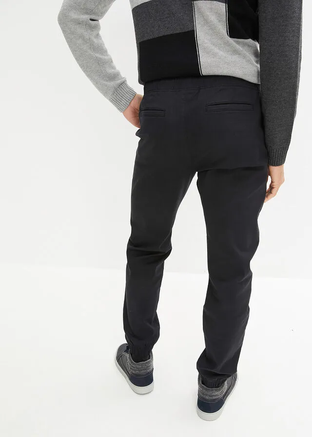 Pantalón elástico tipo chino de corte holgado con pernera recta Negro