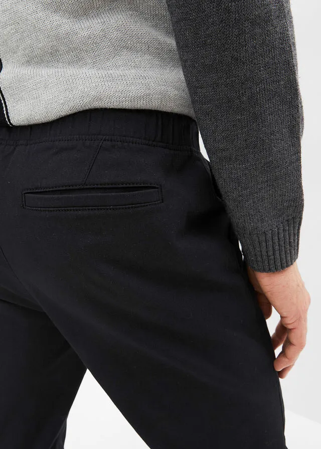 Pantalón elástico tipo chino de corte holgado con pernera recta Negro